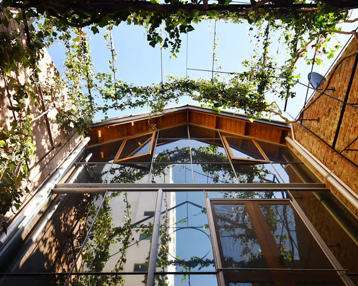 A view from the courtyard upwards at Heritage Home In The Heart Of The City one of the best pet-friendly Perth accommodation options