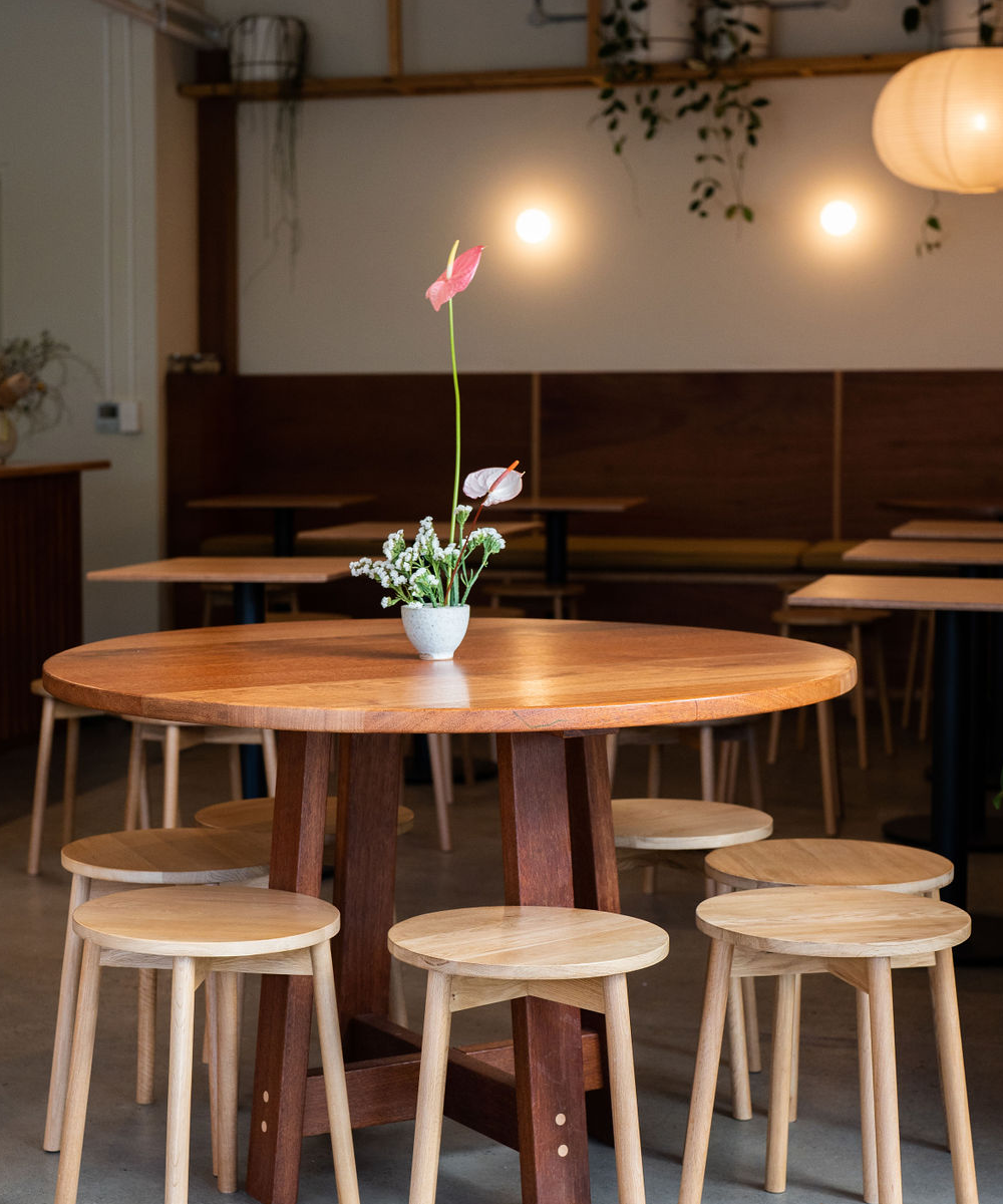 a wooden table in a cafe