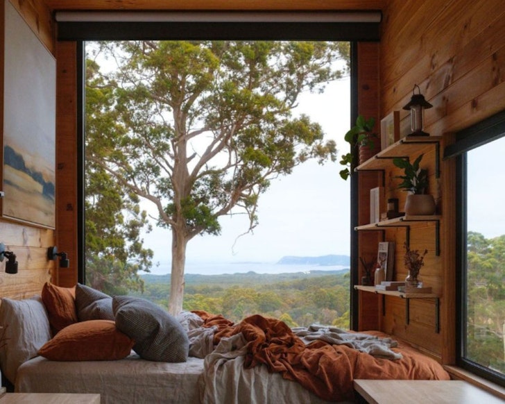 The bedroom with a view at Heyscape Denmark best tiny home stays WA