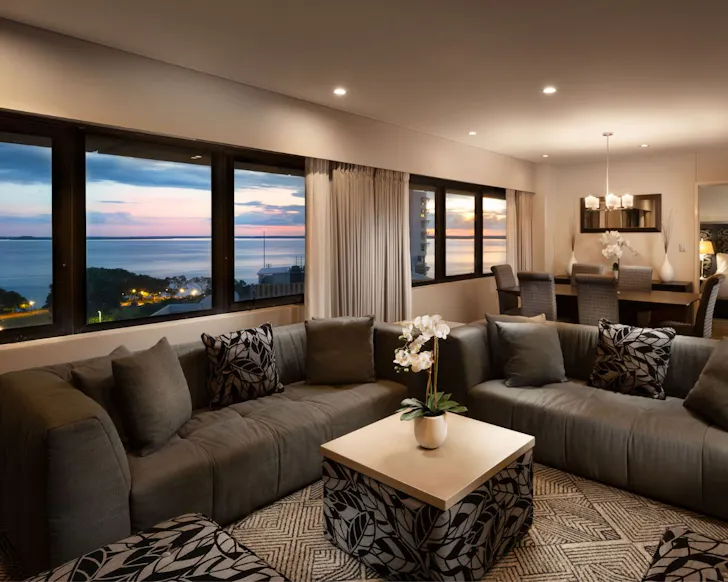 A suite in earthy tones with a sea view at Hilton Darwin one of the best Darwin hotels