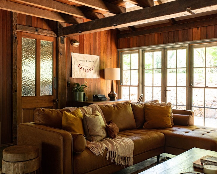 The cosy lounge at Hinterland Barn Loft best winter cabins near Brisbane