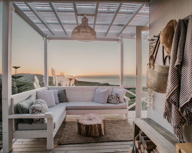 The deck with a view at Hinterland Retreat best tiny homes New Zealand