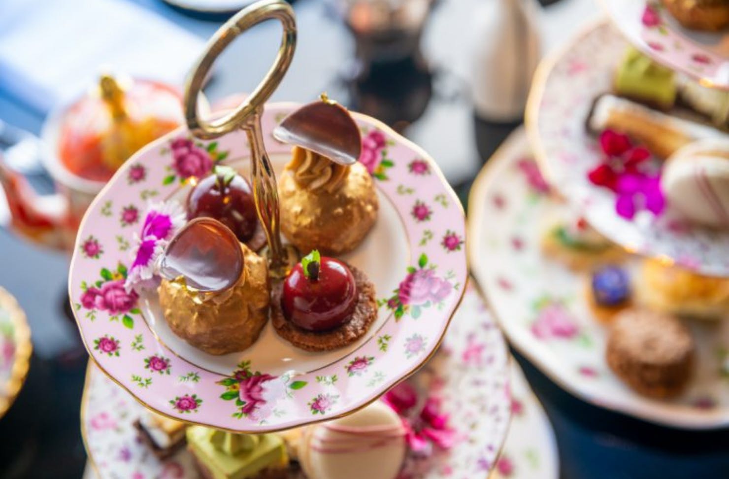 A beautiful selection of savoury and sweets on a high tea tray