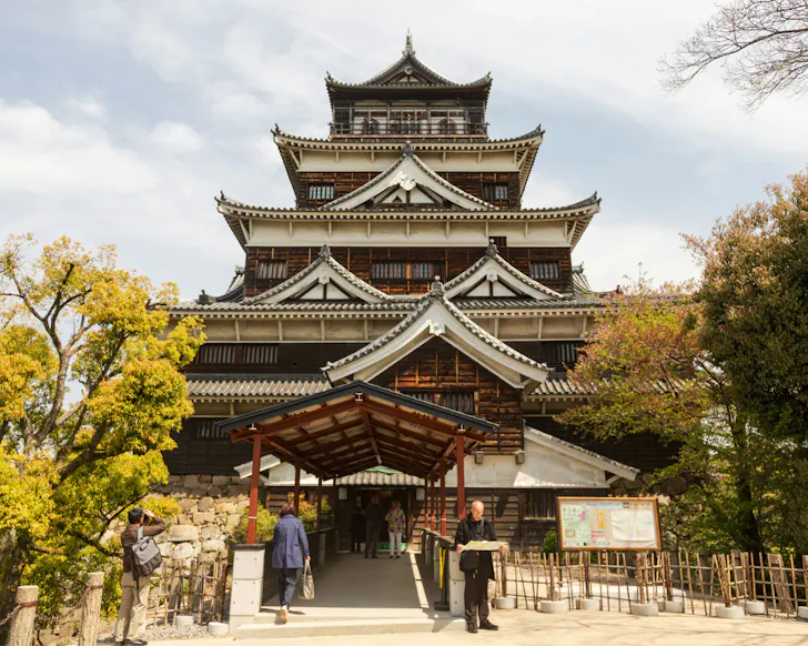 The ancient facade of the towering Hiroshima Castle.
