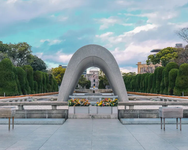 The peaceful memorial to Atomic Bomb victims in Hiroshima, with the eternal flame glowing in the centre.