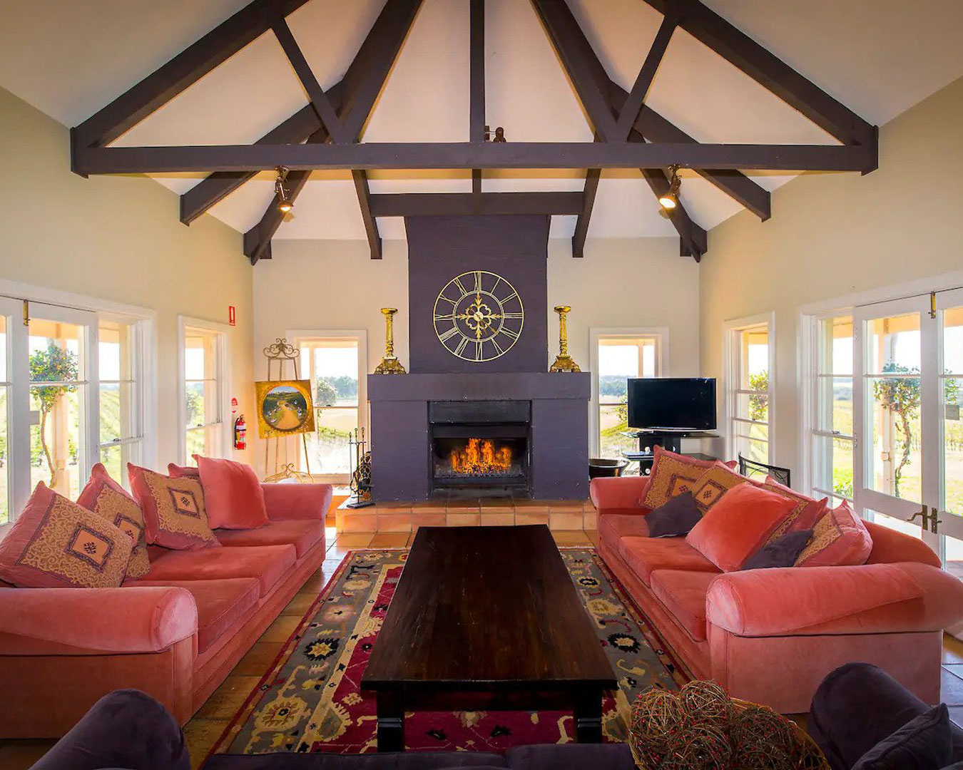 red couches and fireplace