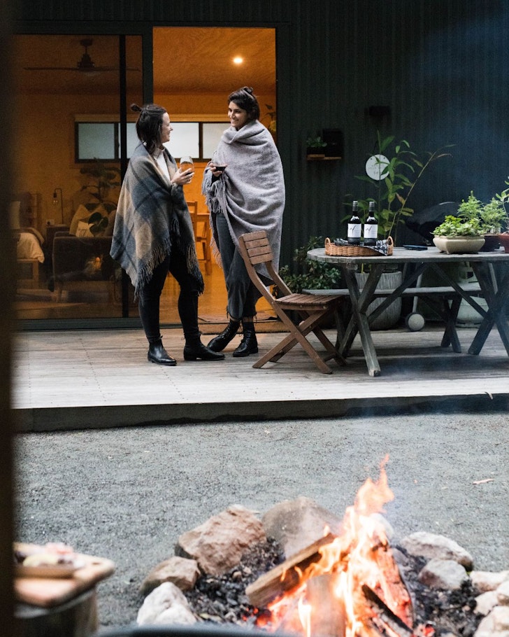 The fire pit outside Homeostasis Retreats Wellness Cabin one of the best Gold Coast Hinterland Airbnbs