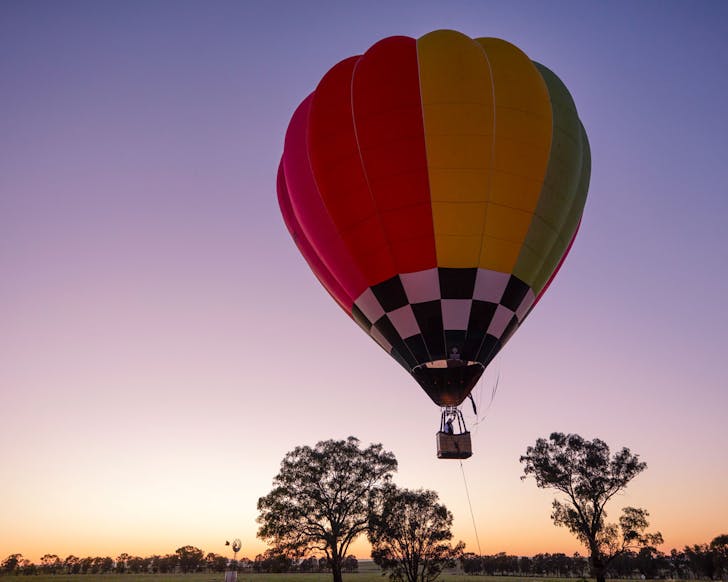 hot air balloon in dawn sky