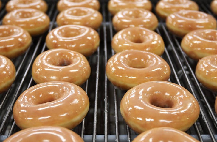 Hot OG Krispy Kreme Doughnuts being served up