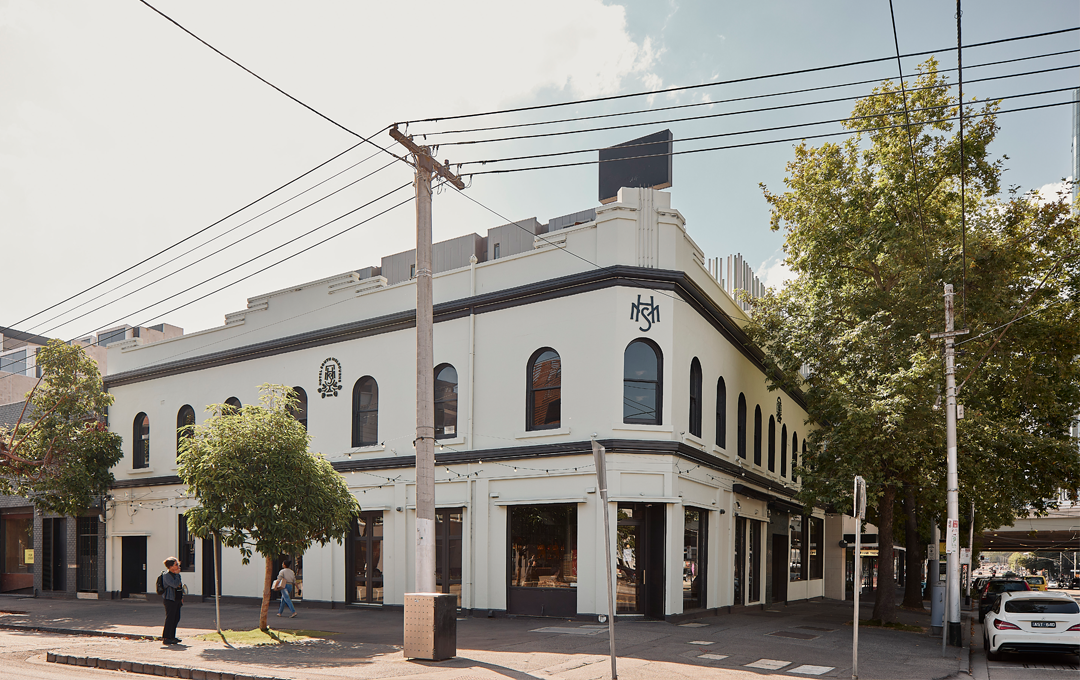 A large white building on a corner, one of the best pubs in Melbourne. 