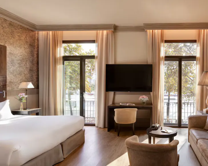 A beautiful bedroom at the tranquil Hotel Duquesa de Cardona in Barcelona. 
