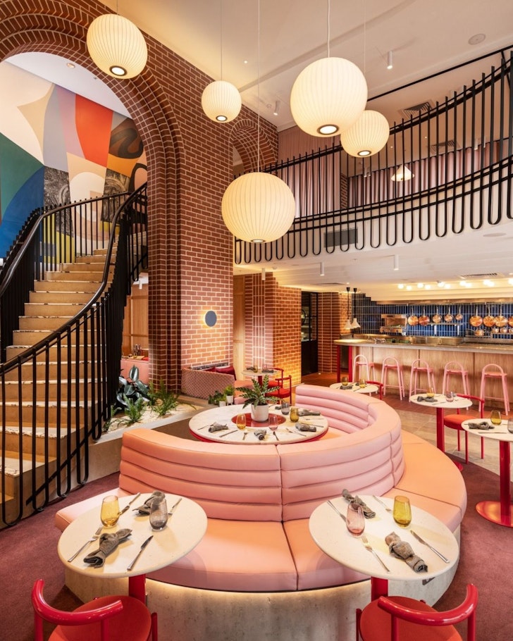 A view of the colourful bar area at Hotel Indigo one of the best Adelaide hotels