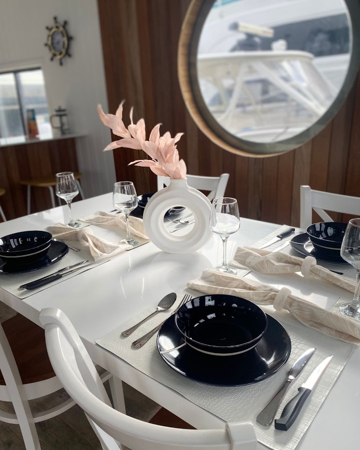 The interior of Houseboat Stay best Cairns Airbnbs