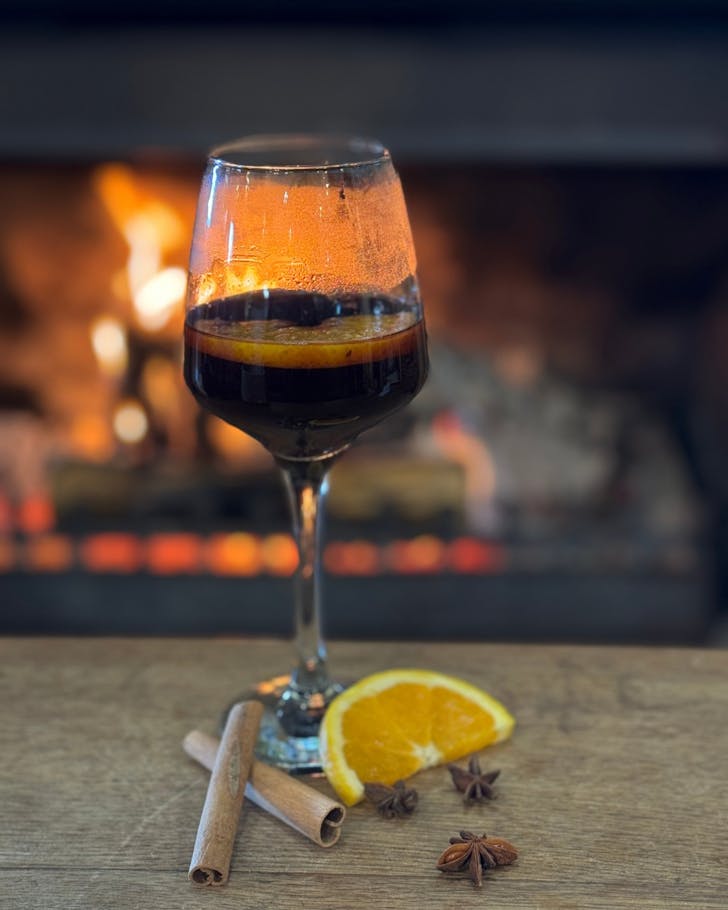 Mulled wine fireside at Hygee at Clifton Bay. 