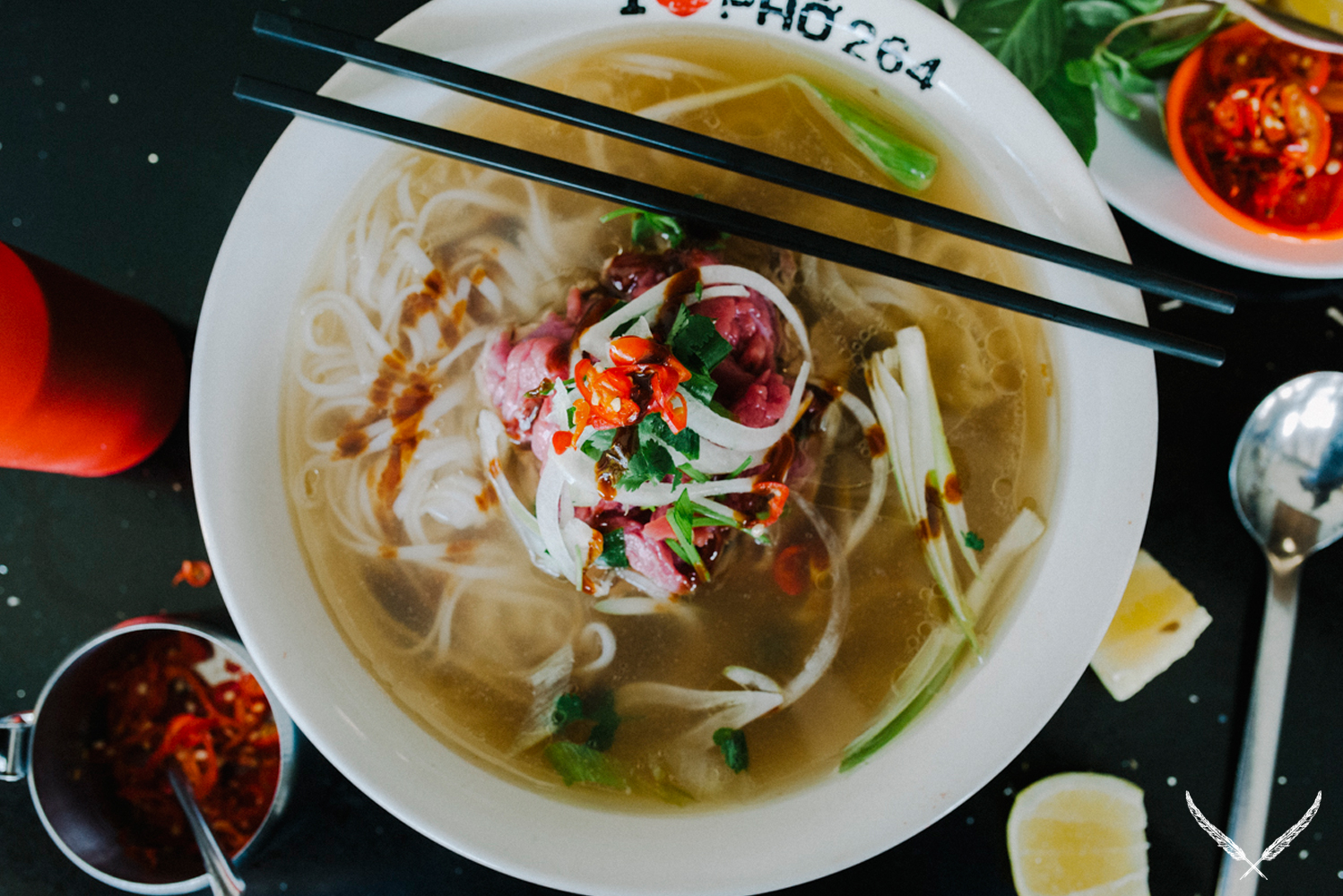 A bowl of Pho with chopsticks from one of the best restaurants in Richmond.