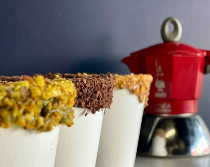 Three different affogato cup flavours line up next to a Moka pot for Bear Gelatoâs latest menu offerings