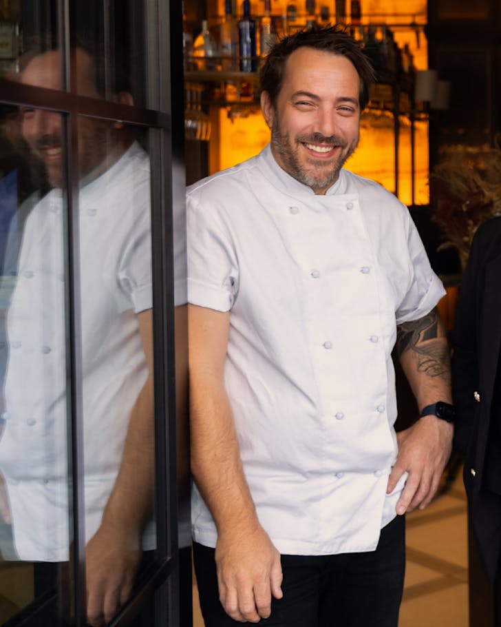 Chef Shaun Dowling from Bossi smiles by the door