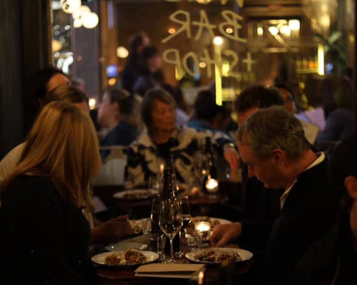 A long table of diners at Pici Wine Bar in TÃÂmaki Makaurau