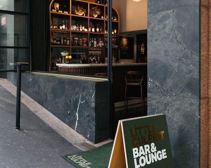 The sleek exterior of Little Culpritâs Cocktail Bar and Wine Lounge