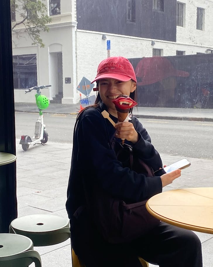 A happy Giapo customer with their Dracula Halloween ice cream 