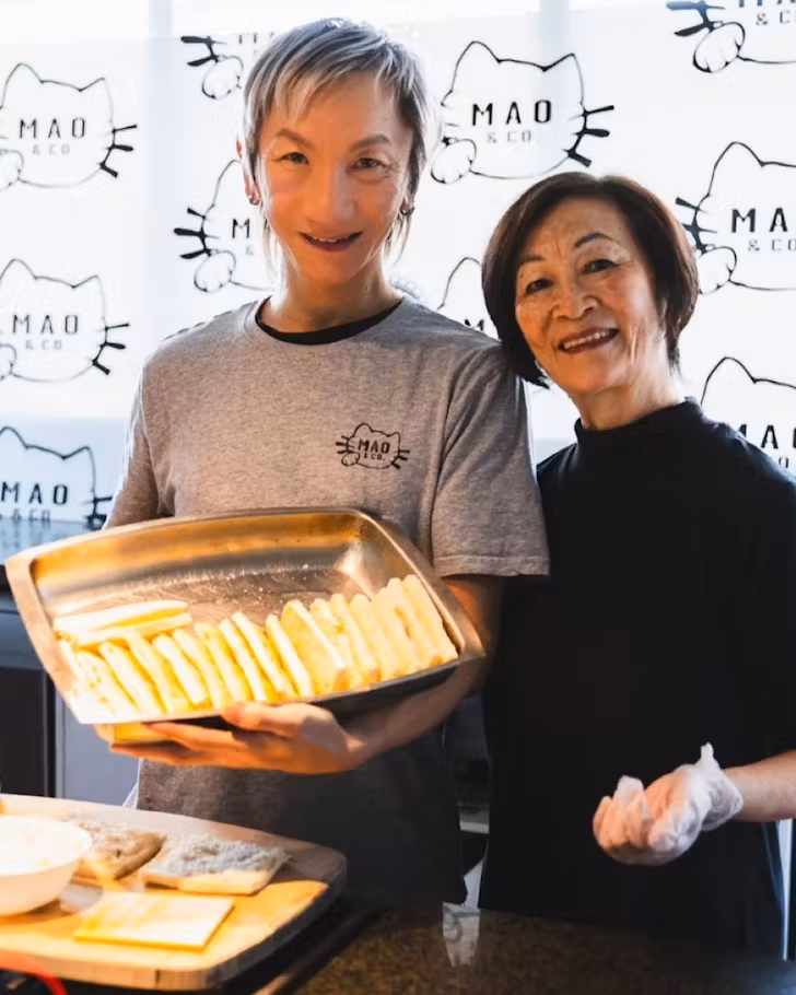 Drew and mama with Mumâs Prawn Toast from Mao & Co.