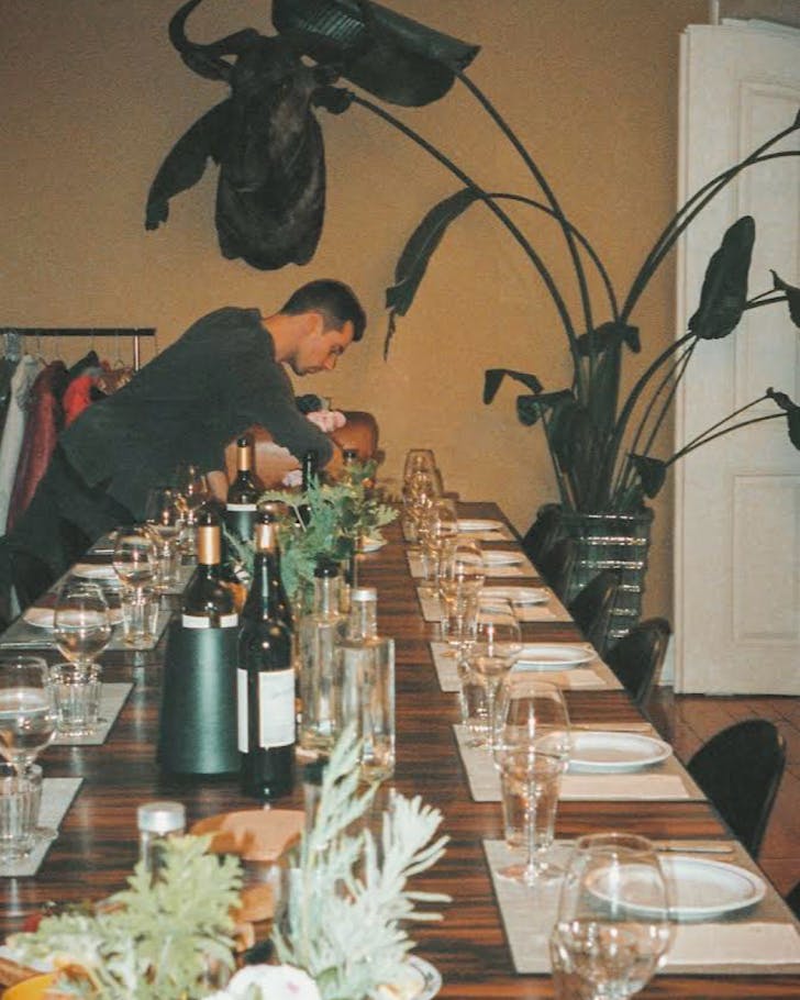 Setting a supper club table with photo taken by Anna Brajkovich