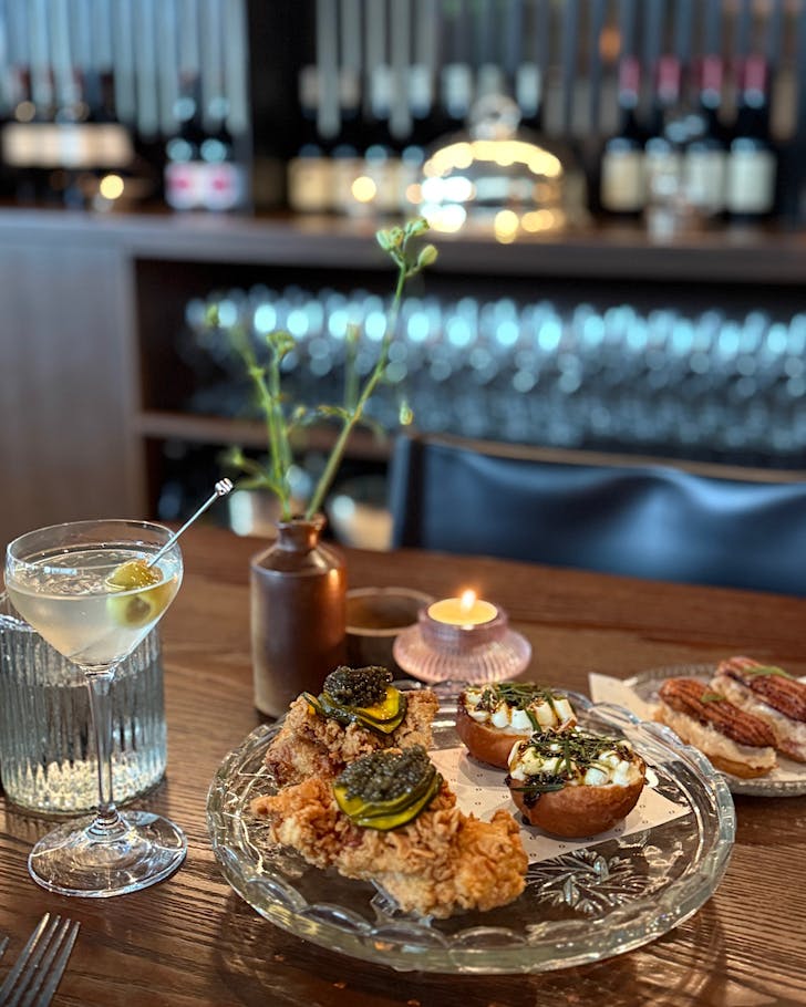 Snacks at Onslow with a martini in hand