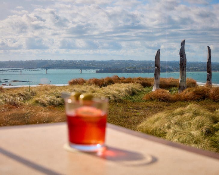 Negroni at Queens Rooftop out of focus deliberately to show off view