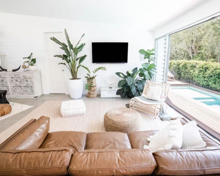 The living space and pool at Isle one of the best Airbnbs on the Sunshine Coast