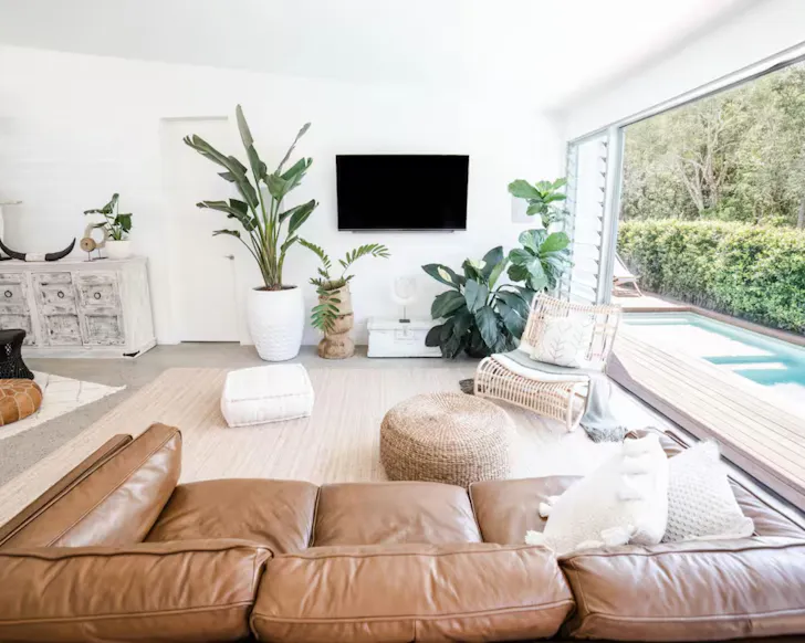 The living space and pool at Isle one of the best Airbnbs on the Sunshine Coast