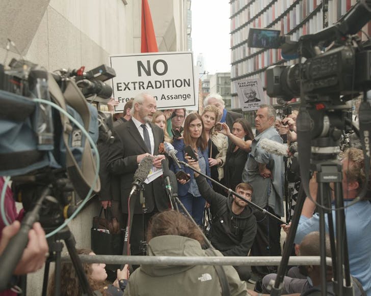 Julian Assange's father addresses the media.