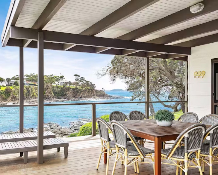 The deck with water views at Integrity at Malua Bay Airbnb one of the best accommodation options near Batemans Bay