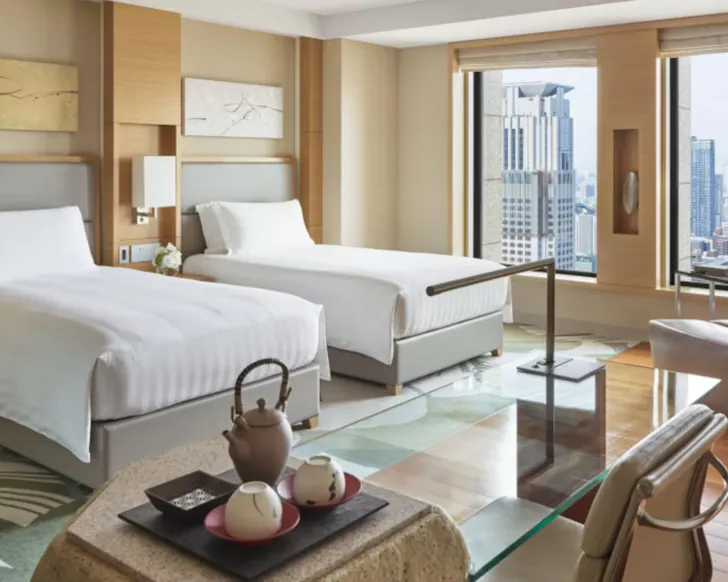 A luxurious room with cityscape views at InterContinental Osaka.