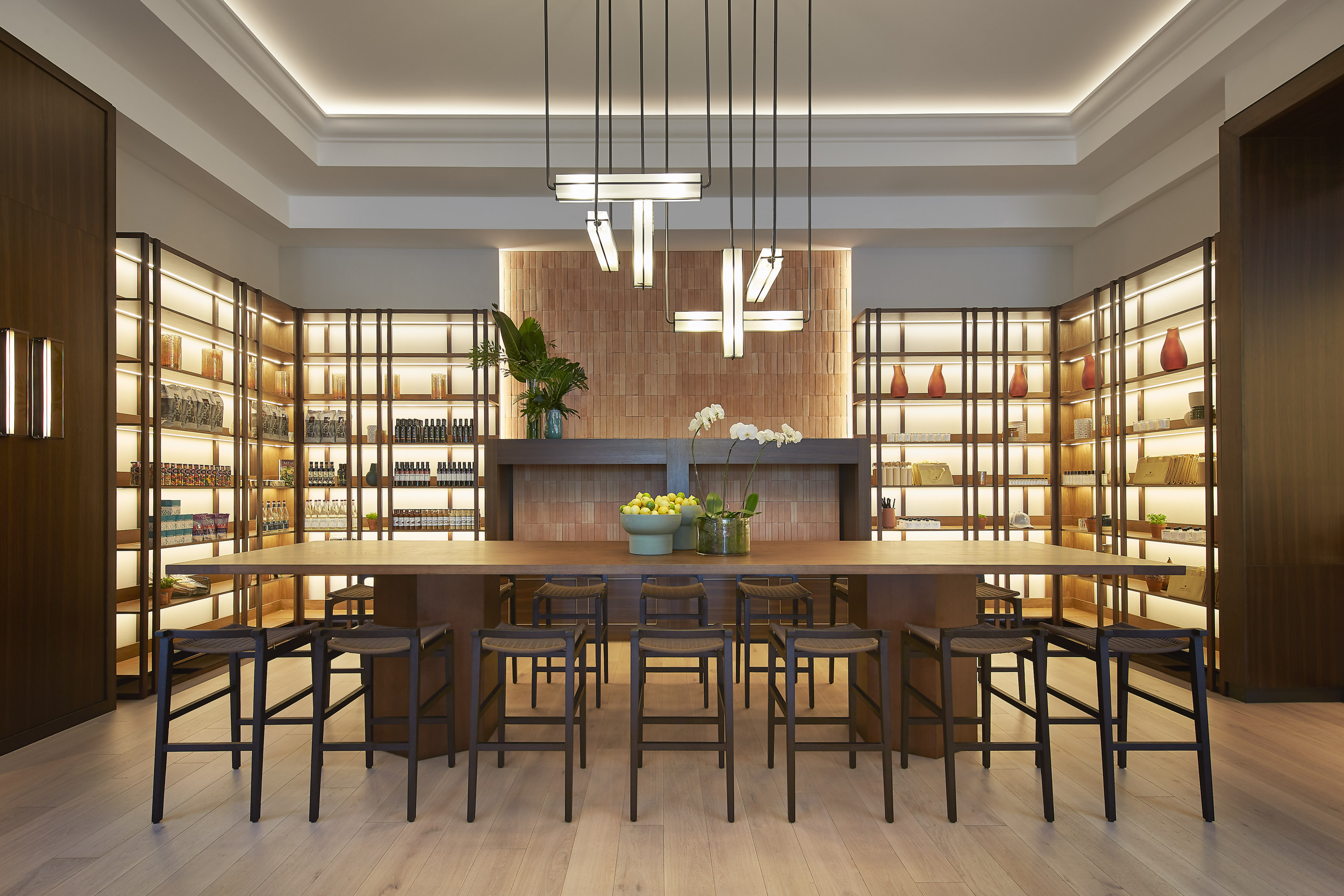 a dining room with illuminated shelves