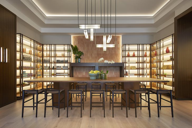 a dining room with illuminated shelves