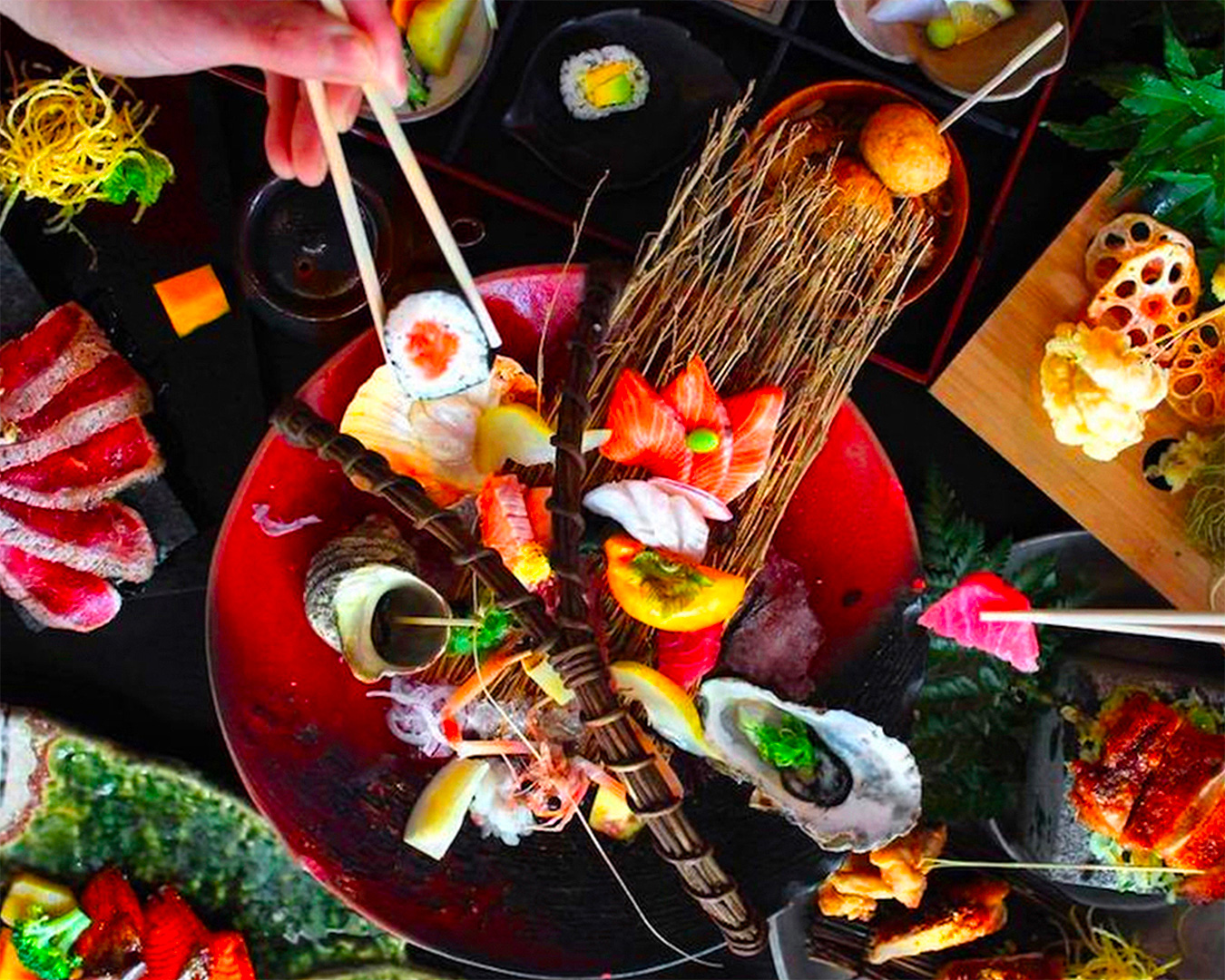 People dig into a wonderful looking spread at Japanese Bistro Zen.