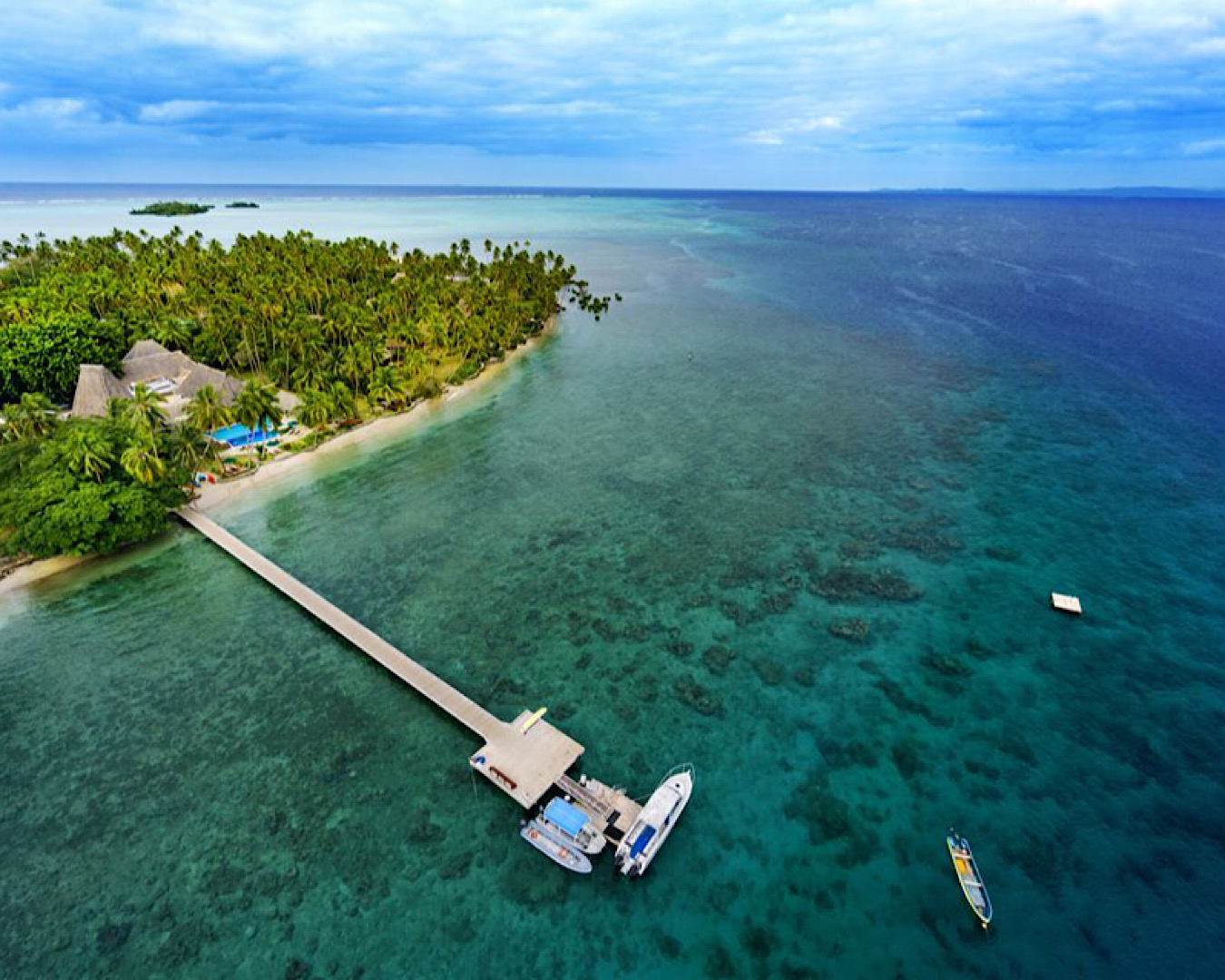 The beautiful Fijian Savusavu Bay at Jean-Micheal Cousteau Resort with a long wharf out to sea. 