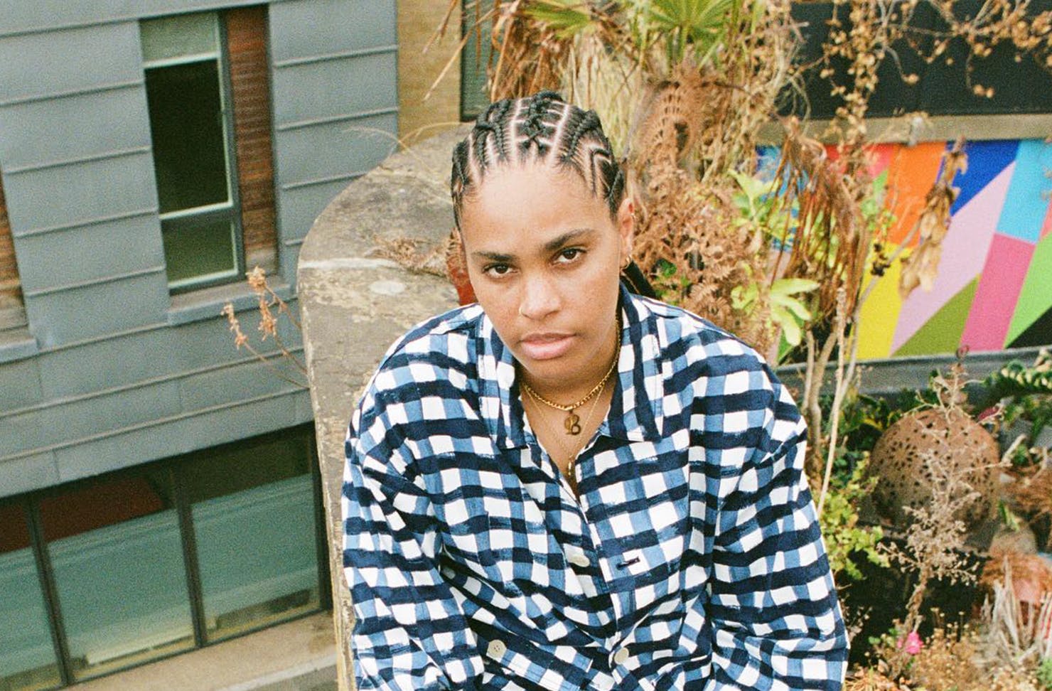 An image of JessB sitting and looking directly at the camera