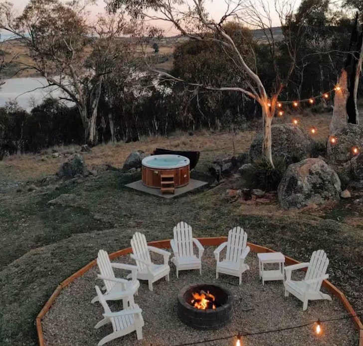 The fire pit and outdoor spa at Jillamatong House one of the best Airbnb accommodation options near Jindabyne for groups