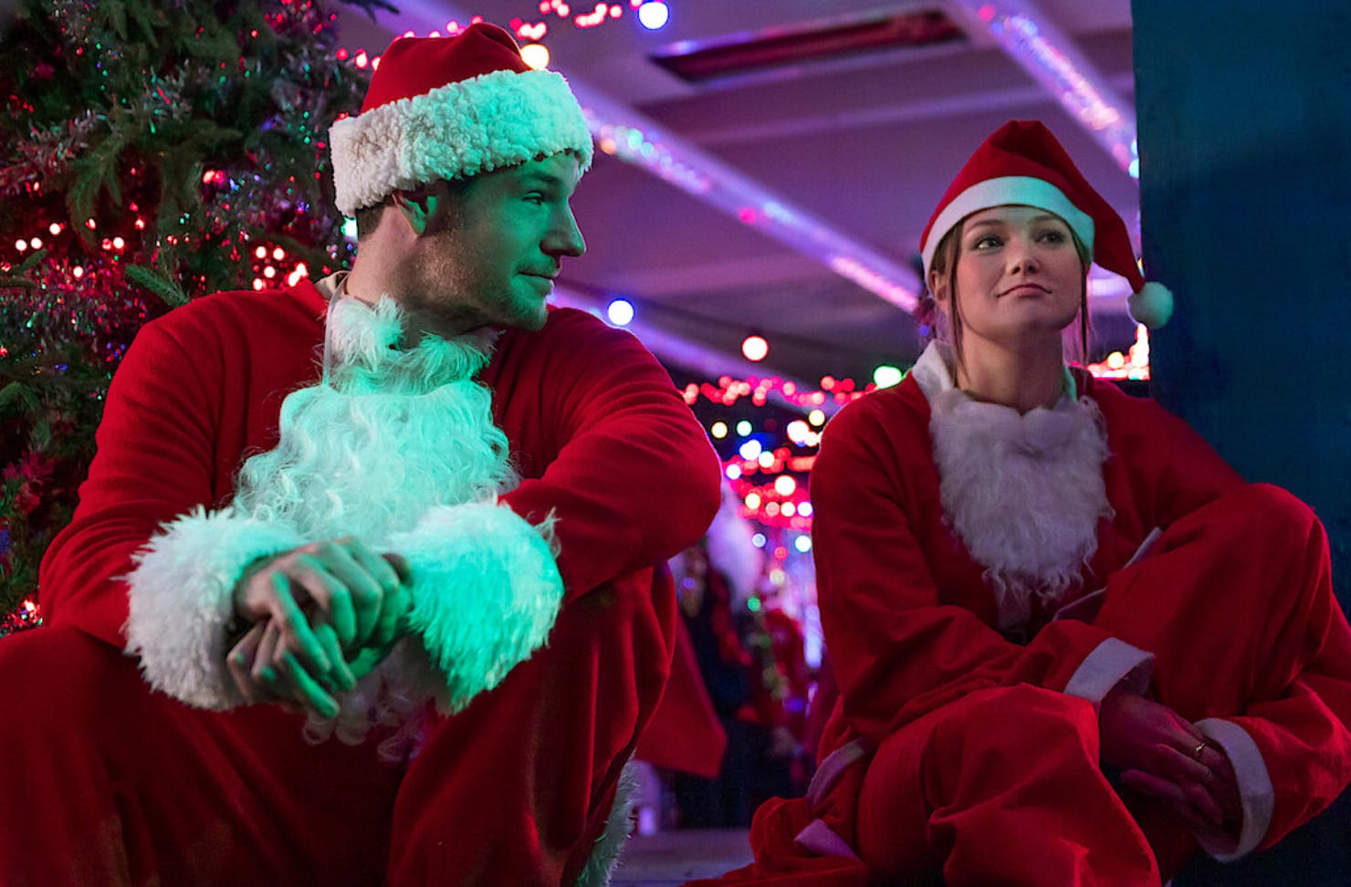 Olivia Holt and Connor Swindells dressed up as Santa for Jingle Bell Heist