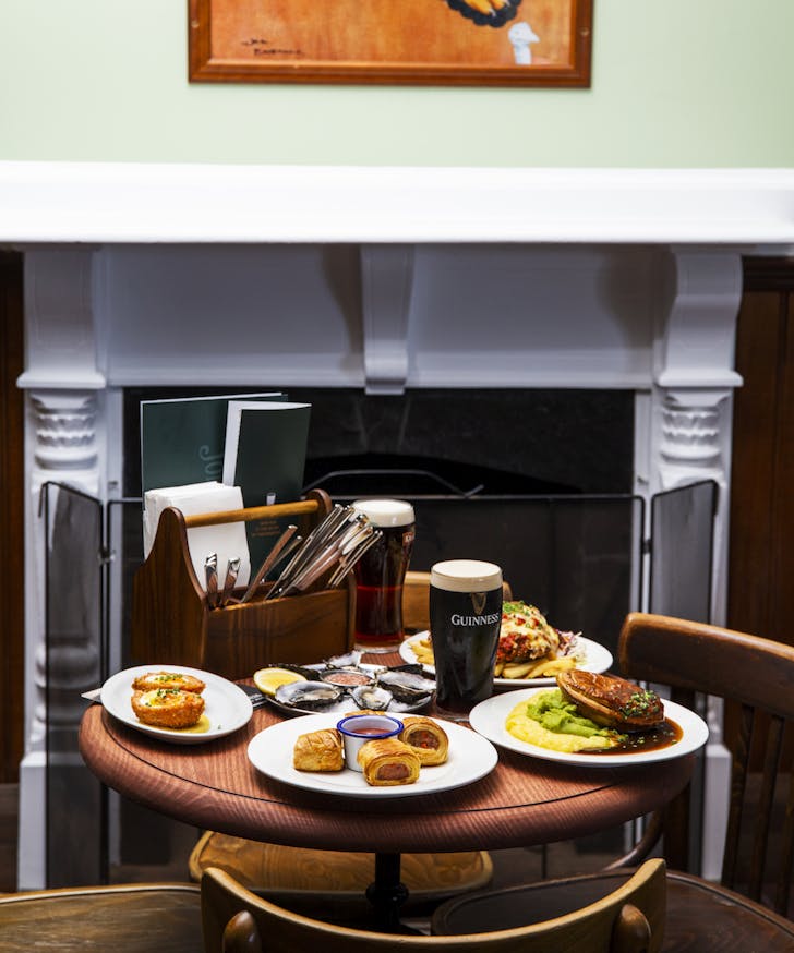 A table filled with food and drink at Johnny Fox's