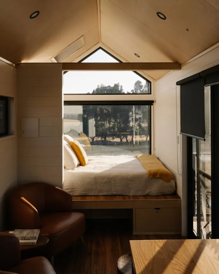 The bedroom with a view at Juniper Tiny House one of the best romantic getaways WA