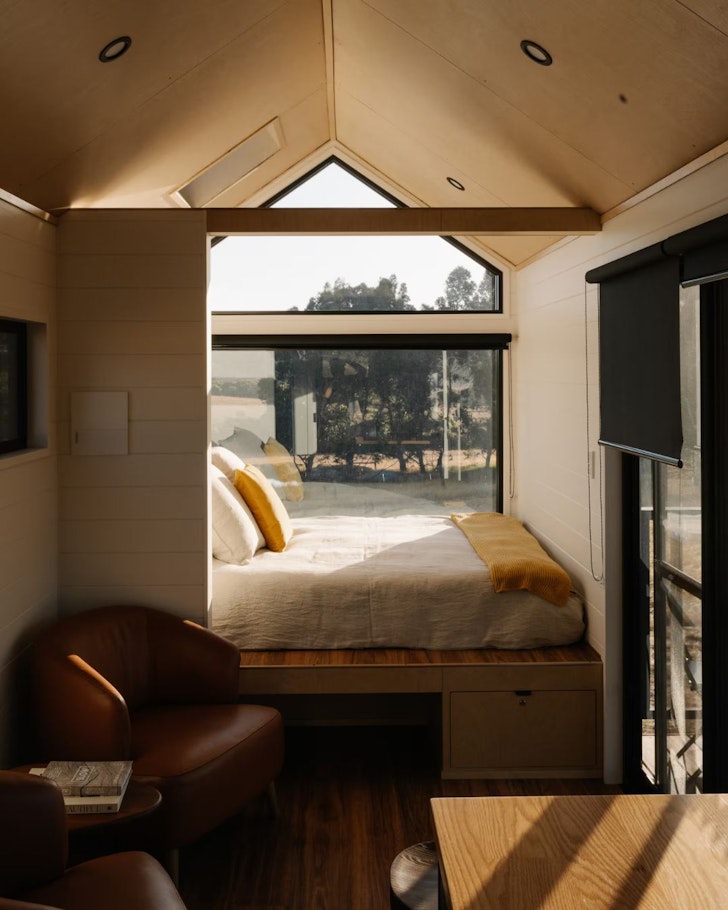 The bedroom with a view at Juniper Tiny House one of the best romantic getaways WA