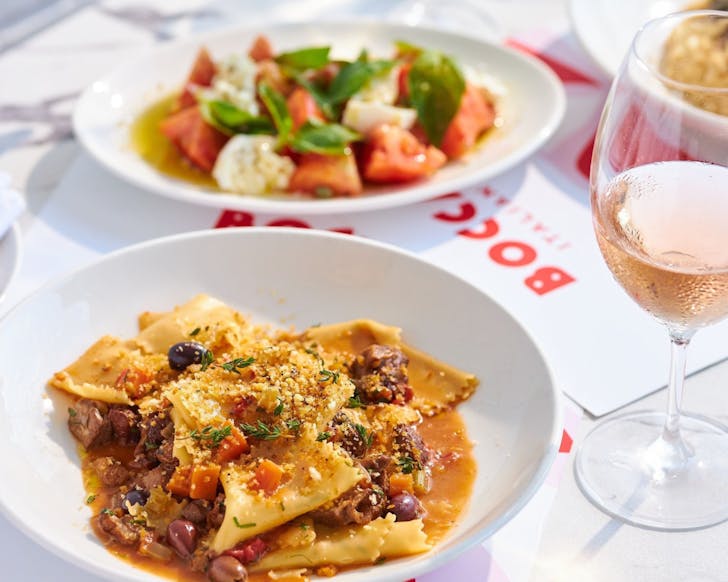 Two plates of italian on table