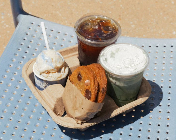 Two drinks and treats in holder