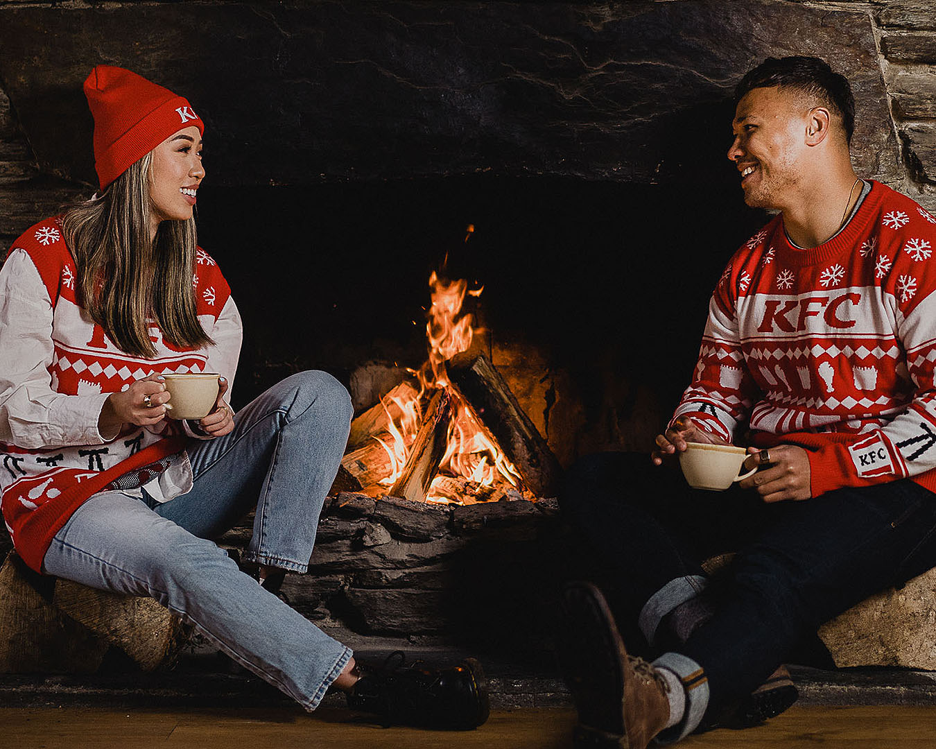 Mid winter jumpers and beanies are worn around a roaring fire.