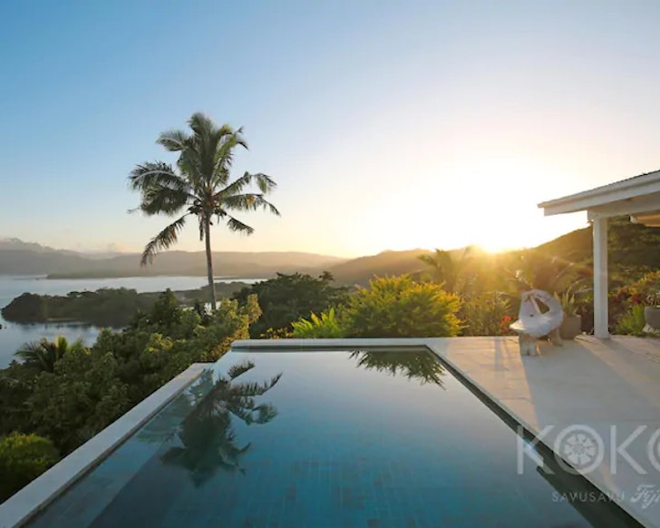 The infinity pool and sea view at KOKO Savusavu Ocean View, Fiji