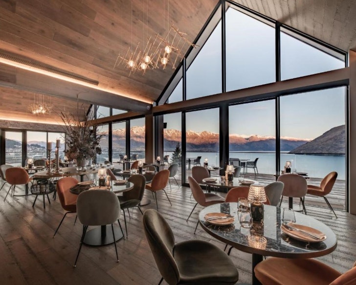 The restaurant with a lake view at Kamana Lakehouse one of the best Queenstown hotels