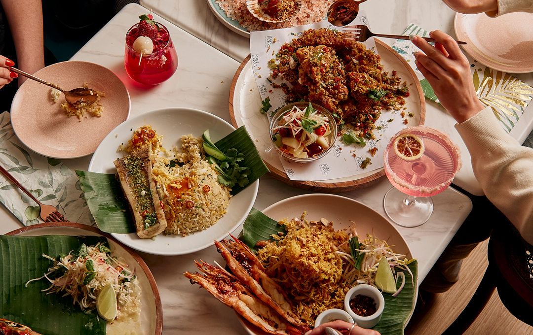 A table filled of dishes at one of the best Thai restaurants Melbourne. 