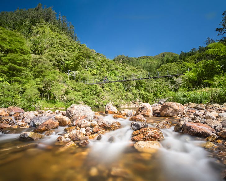 Water rushing over rocks at the fantastic Karangahake Gorge.